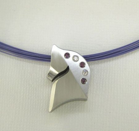 The Statement© in sterling silver with white and purple diamonds