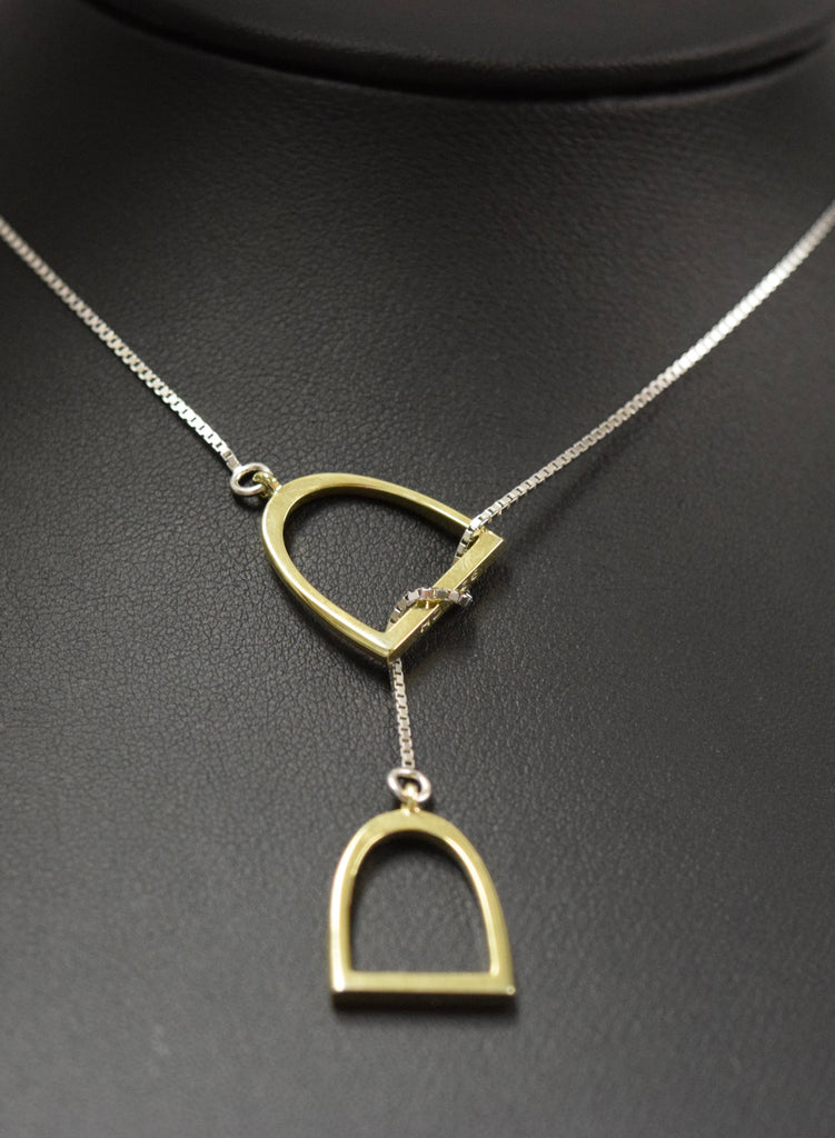 The "Annmarie" Lariat In Stainless Steel with 14kt Plated Yellow Gold Stirrups.