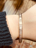 Stainless Steel Bracelet with Beautiful Roman Numeral Accents.
