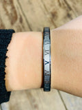 Stainless Steel Bracelet with Beautiful Roman Numeral Accents.