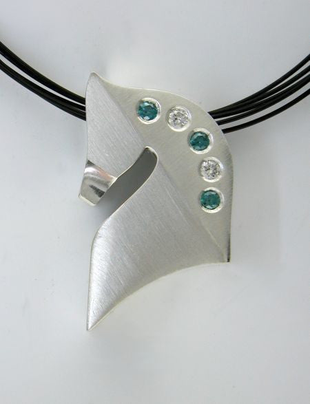 The Statement© in stainless steel with blue and white diamonds